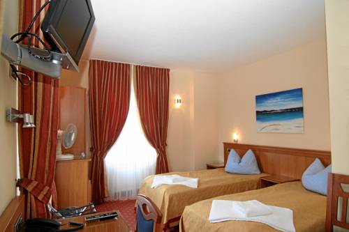 Imagen de la habitación del Hotel Axion. Foto 7