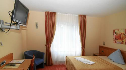 Imagen de la habitación del Hotel Axion. Foto 12