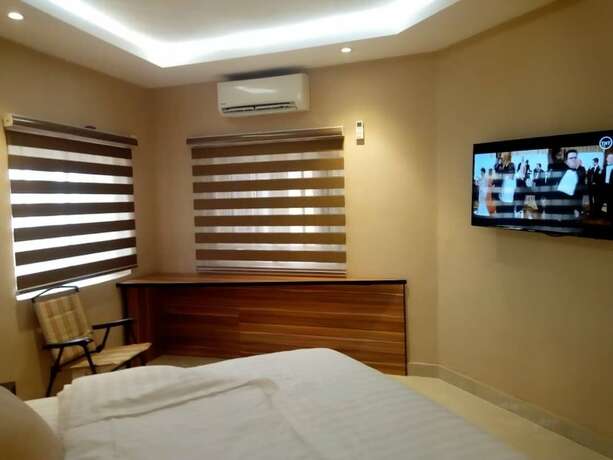 Imagen de la habitación del Hotel Axion Honors. Foto 14