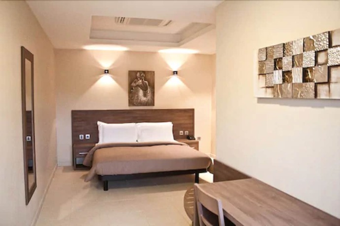 Imagen de la habitación del Hotel Axis Suites. Foto 10
