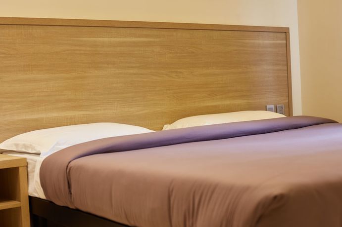 Imagen de la habitación del Hotel Axis Suites. Foto 12