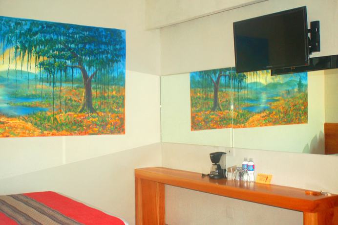 Imagen de la habitación del Hotel Axkan Arte Tuxtla. Foto 11