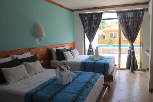 Imagen de la habitación del Hotel Axkan Tulum. Foto 7