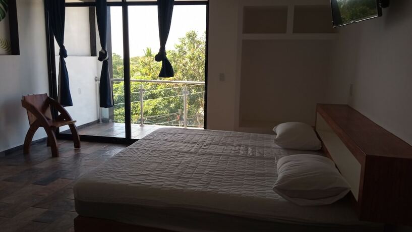 Imagen de la habitación del Hotel Axolotl. Foto 18