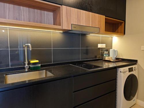 Imagen de la habitación del Hotel Axon Serviced Suites Kuala Lumpur. Foto 19