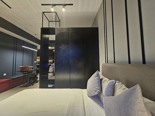 Imagen de la habitación del Hotel Axon Suites Bukit Bintang. Foto 12