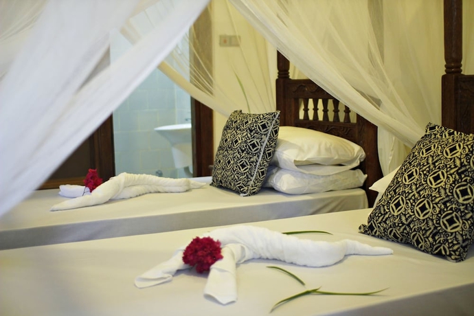 Imagen de la habitación del Hotel Aya Beach Bungalows. Foto 5