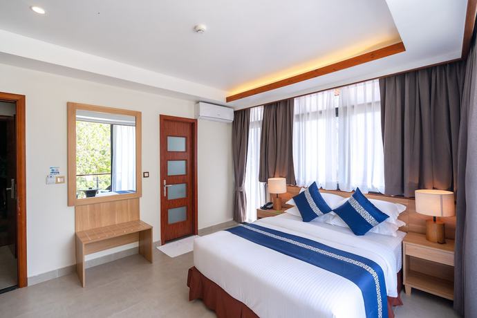 Imagen de la habitación del Hotel Ayala Ocean View. Foto 10