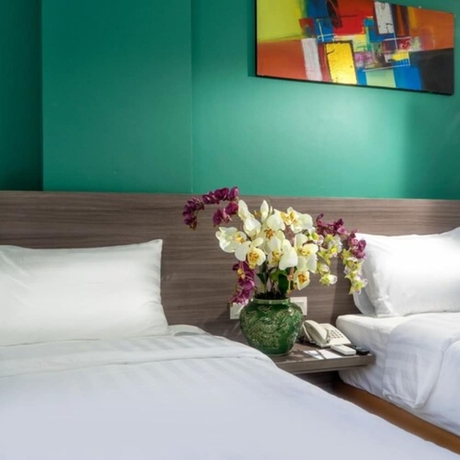Imagen de la habitación del Hotel Ayani Banda Aceh. Foto 14