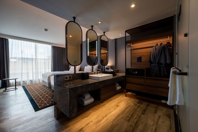 Imagen de la habitación del Hotel Ayathorn Bangkok. Foto 13