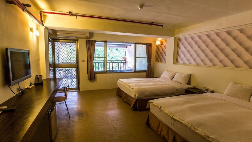Imagen de la habitación del Hotel Ayawan Hot Spring Resort. Foto 9