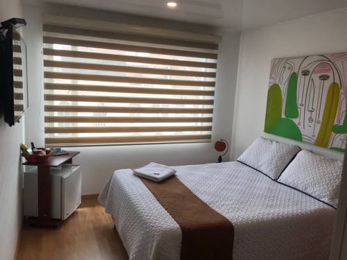 Imagen de la habitación del Hotel Ayenda 1032 Titas House. Foto 2