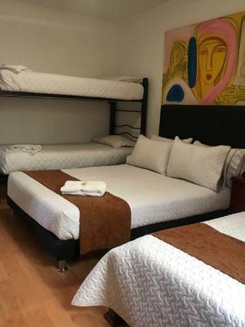 Imagen de la habitación del Hotel Ayenda 1032 Titas House. Foto 6