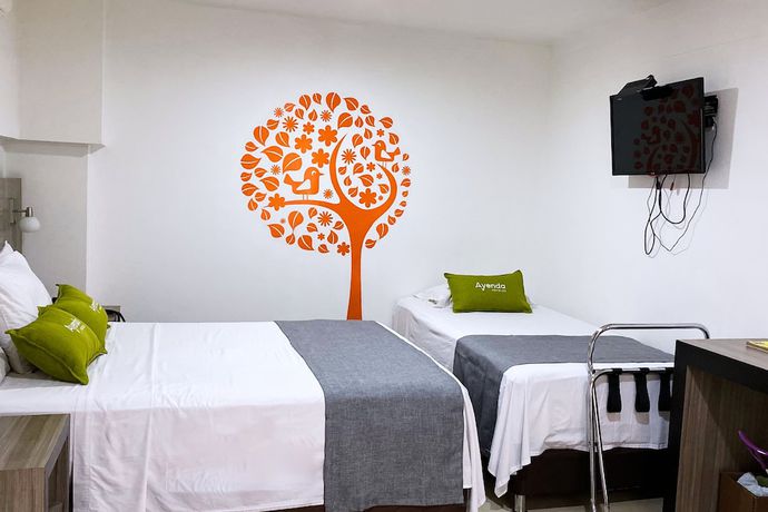 Imagen de la habitación del Hotel Ayenda 1136 MH. Foto 14