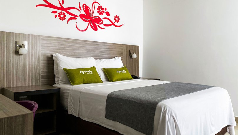 Imagen de la habitación del Hotel Ayenda 1136 MH. Foto 15