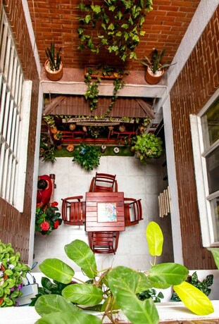 Imagen de los exteriores del Hotel Ayenda 1422 Caney. Foto 35