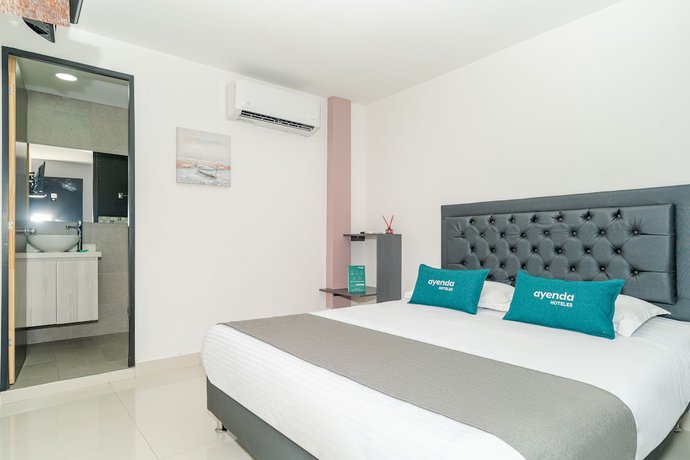 Imagen de la habitación del Hotel Ayenda 79. Foto 13