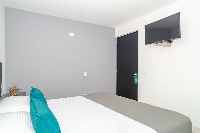Imagen de la habitación del Hotel Ayenda 79. Foto 15