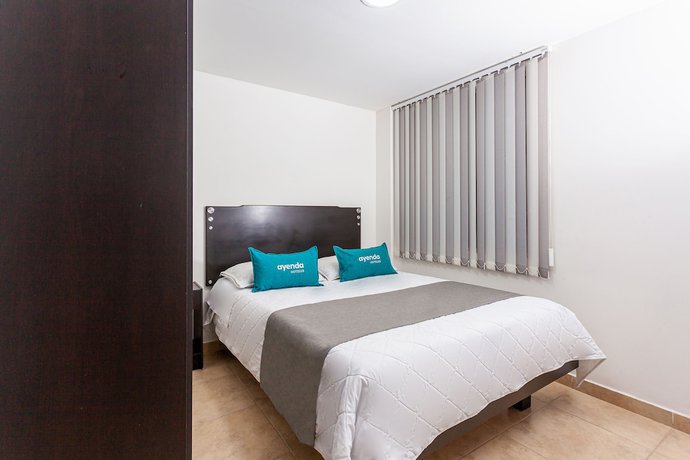 Imagen de la habitación del Hotel Ayenda Agustin Plaza. Foto 4