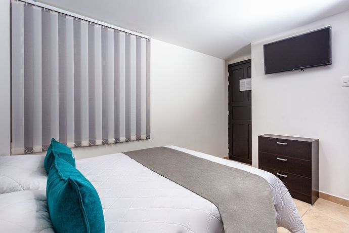 Imagen de la habitación del Hotel Ayenda Agustin Plaza. Foto 9