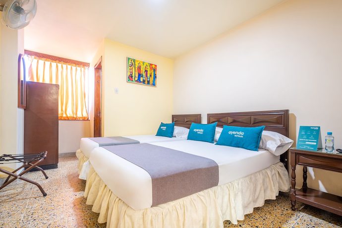 Imagen de la habitación del Hotel Ayenda Almirante. Foto 11