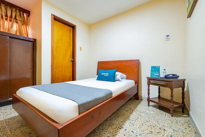 Imagen de la habitación del Hotel Ayenda Almirante. Foto 12