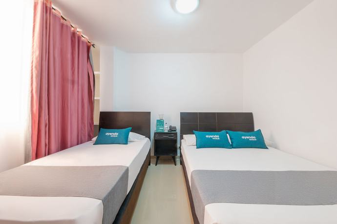 Imagen de la habitación del Hotel Ayenda Ambeima. Foto 3