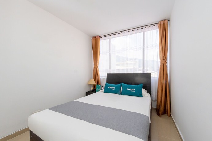 Imagen de la habitación del Hotel Ayenda Ambeima. Foto 8