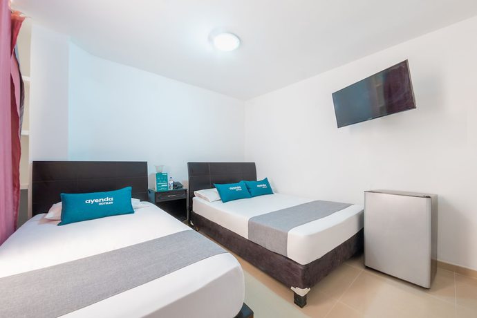 Imagen de la habitación del Hotel Ayenda Ambeima. Foto 11