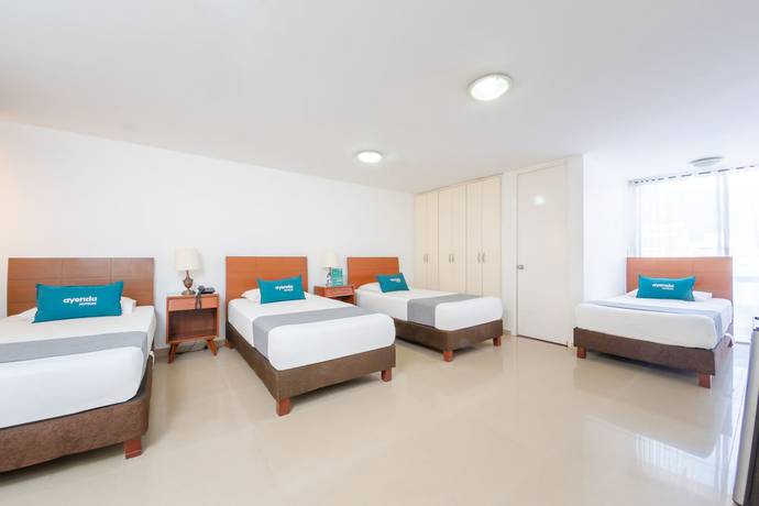 Imagen de la habitación del Hotel Ayenda Ambeima. Foto 13