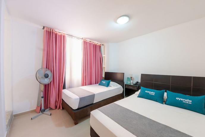 Imagen de la habitación del Hotel Ayenda Ambeima. Foto 16