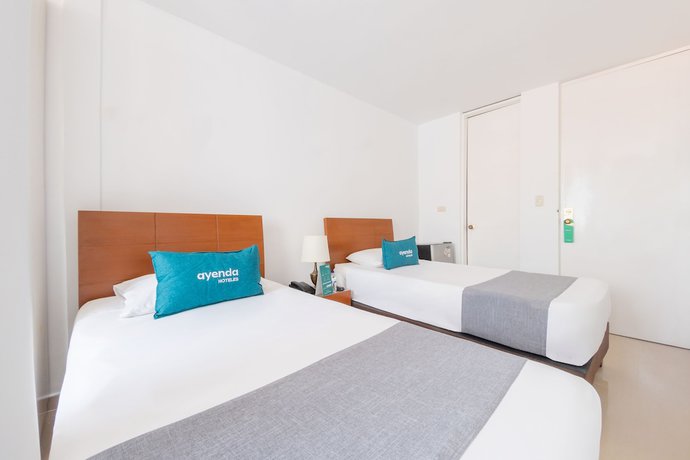 Imagen de la habitación del Hotel Ayenda Ambeima. Foto 17