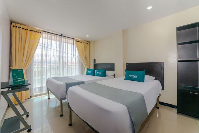 Imagen de la habitación del Hotel Ayenda Balcon Real. Foto 14