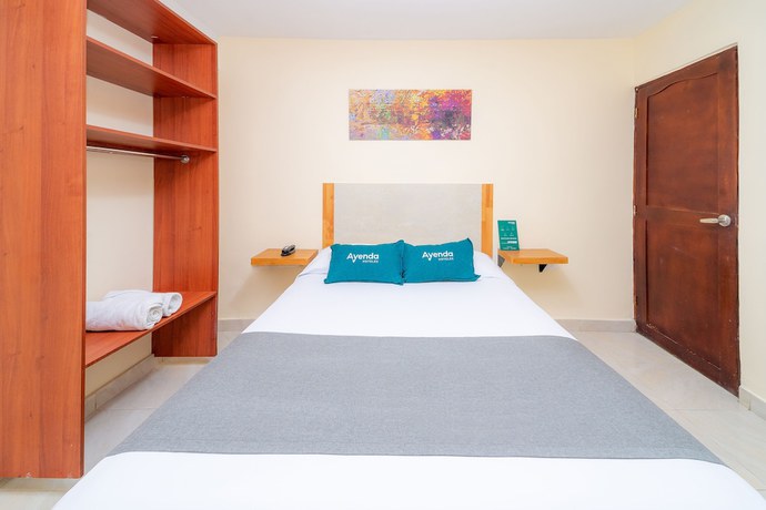 Imagen de la habitación del Hotel Ayenda Baly Express. Foto 8