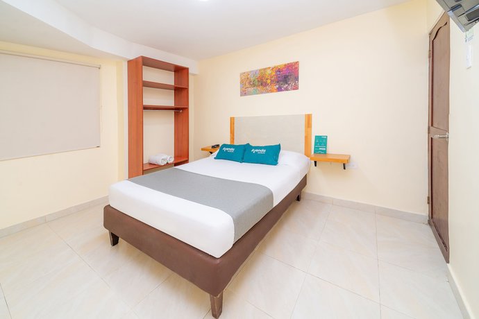 Imagen de la habitación del Hotel Ayenda Baly Express. Foto 9