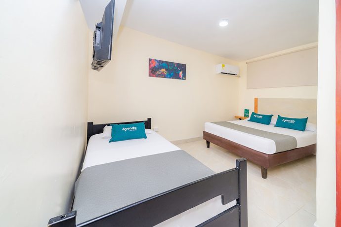 Imagen de la habitación del Hotel Ayenda Baly Express. Foto 13