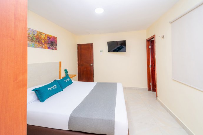 Imagen de la habitación del Hotel Ayenda Baly Express. Foto 14