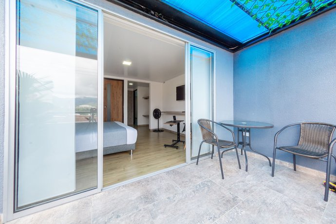 Imagen de la habitación del Hotel Ayenda Bee. Foto 13