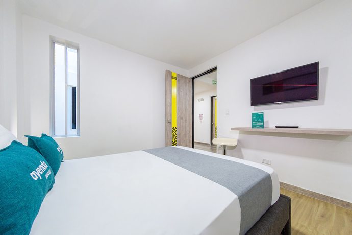 Imagen de la habitación del Hotel Ayenda Bee. Foto 14