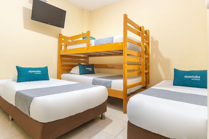 Imagen de la habitación del Hotel Ayenda Boutique La Trinidad. Foto 7