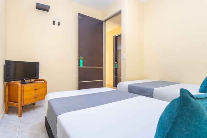 Imagen de la habitación del Hotel Ayenda Boutique La Trinidad. Foto 8