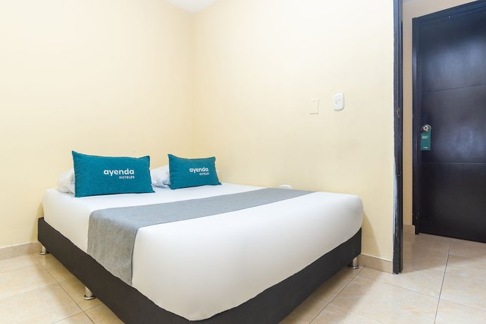 Imagen de la habitación del Hotel Ayenda Boutique La Trinidad. Foto 16