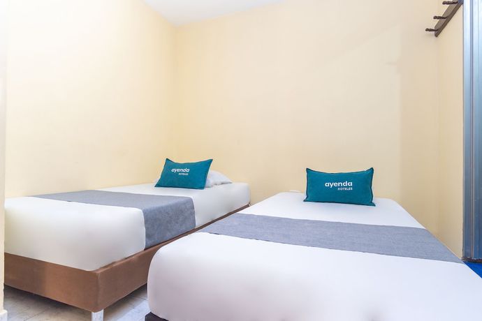 Imagen de la habitación del Hotel Ayenda Boutique La Trinidad. Foto 18