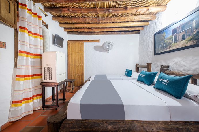 Imagen de la habitación del Hotel Ayenda Boutique Macaregua Giron. Foto 10