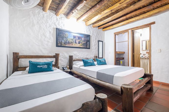Imagen de la habitación del Hotel Ayenda Boutique Macaregua Giron. Foto 11