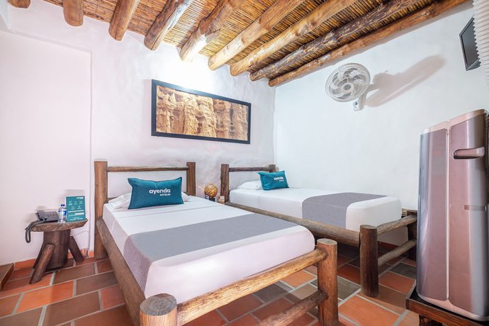 Imagen de la habitación del Hotel Ayenda Boutique Macaregua Giron. Foto 14