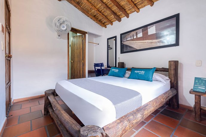 Imagen de la habitación del Hotel Ayenda Boutique Macaregua Giron. Foto 16