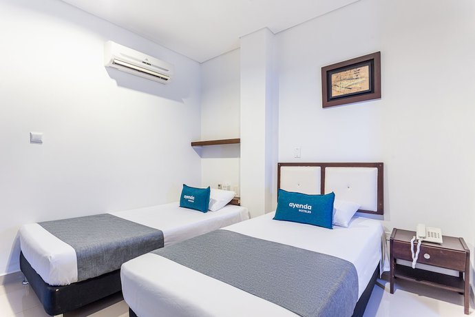 Imagen de la habitación del Hotel Ayenda Boutique Rio Mont. Foto 13