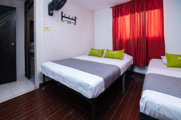 Imagen de la habitación del Hotel Ayenda Calypso 1142. Foto 10