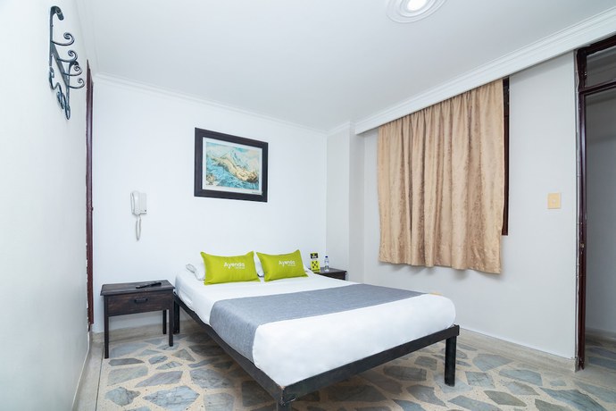 Imagen de la habitación del Hotel Ayenda Calypso 1142. Foto 13